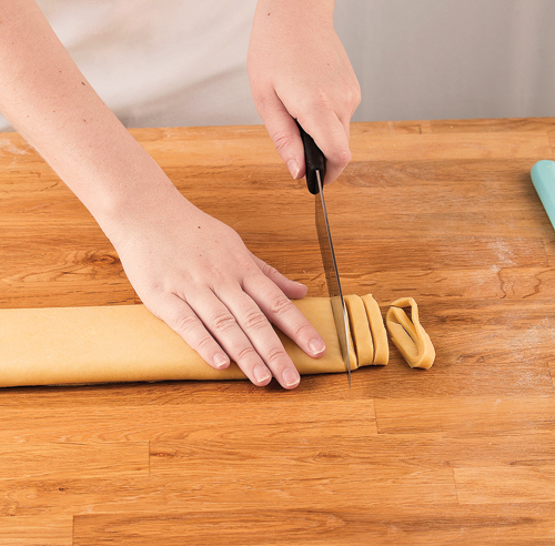 Cutting the rolled dough sheet