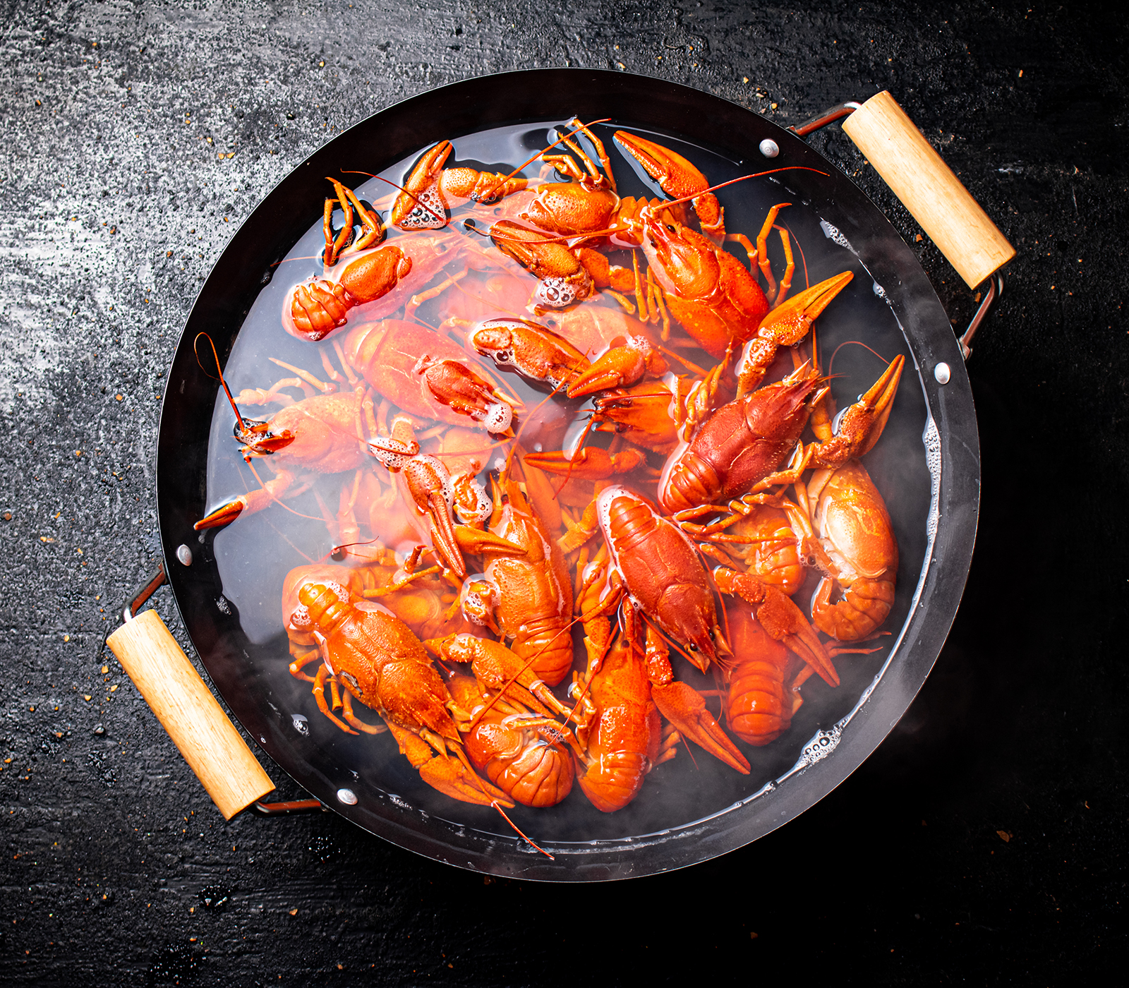 View of lobsters in a cooking pot